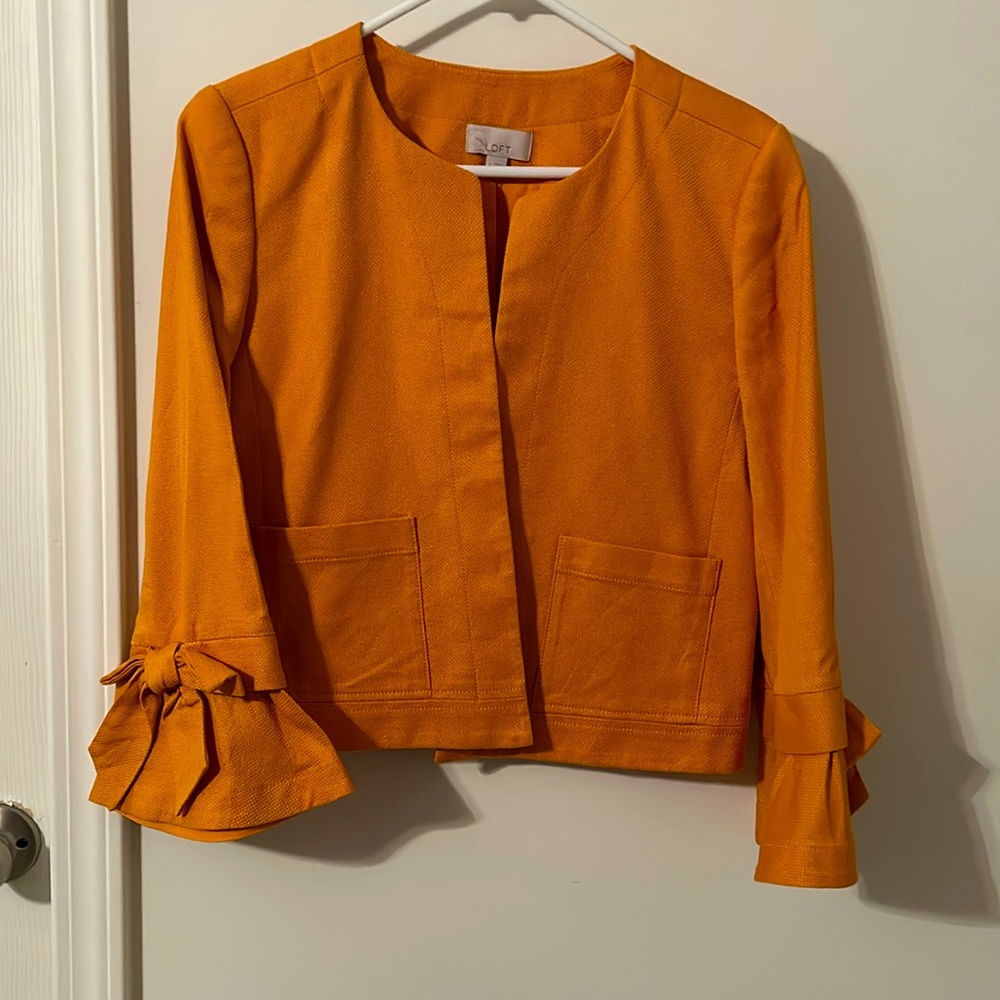 Gold, bell sleeve blazer with bow accents